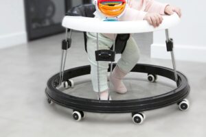 Seated baby walker